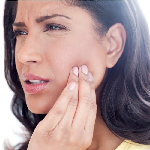 woman with tooth pain